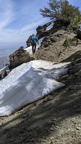 walking behind another hiker